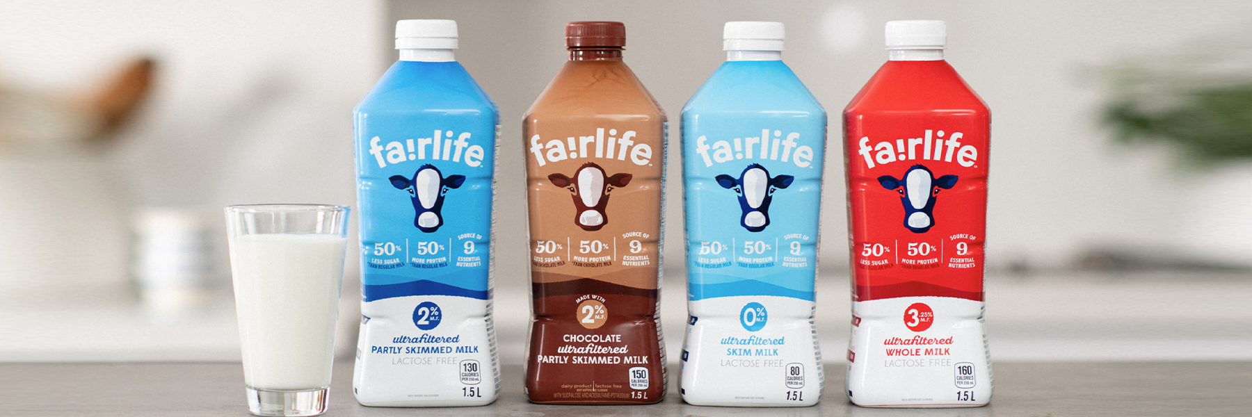 Lineup of fairlife milk varieties in a kitchen